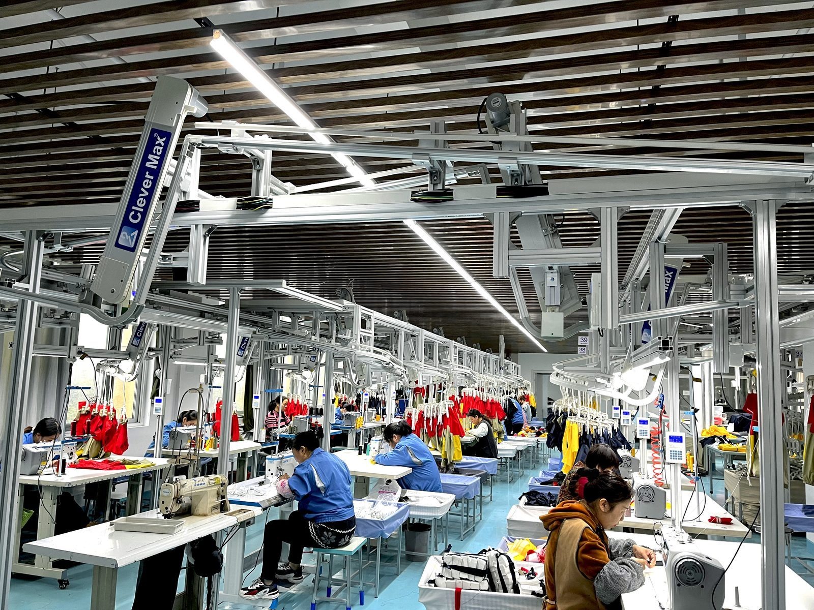 YoungOne Group sewing station served by the CleverMax hanger system