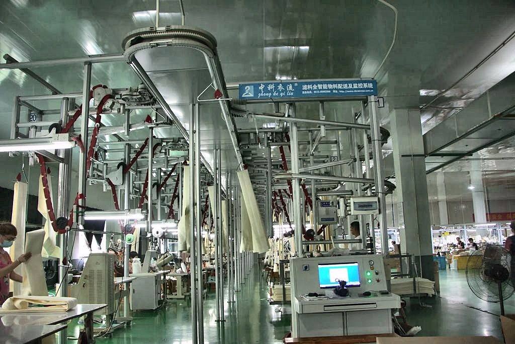 CleverMax hanger system on an industrial filter bag production line