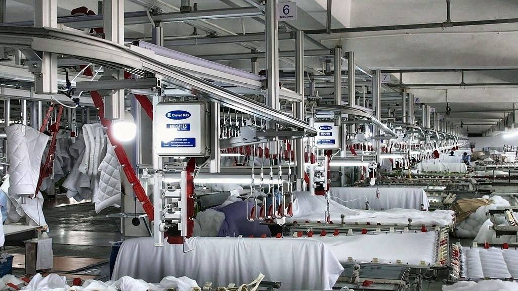 CleverMax hanger system on a down comforter and quilt production line